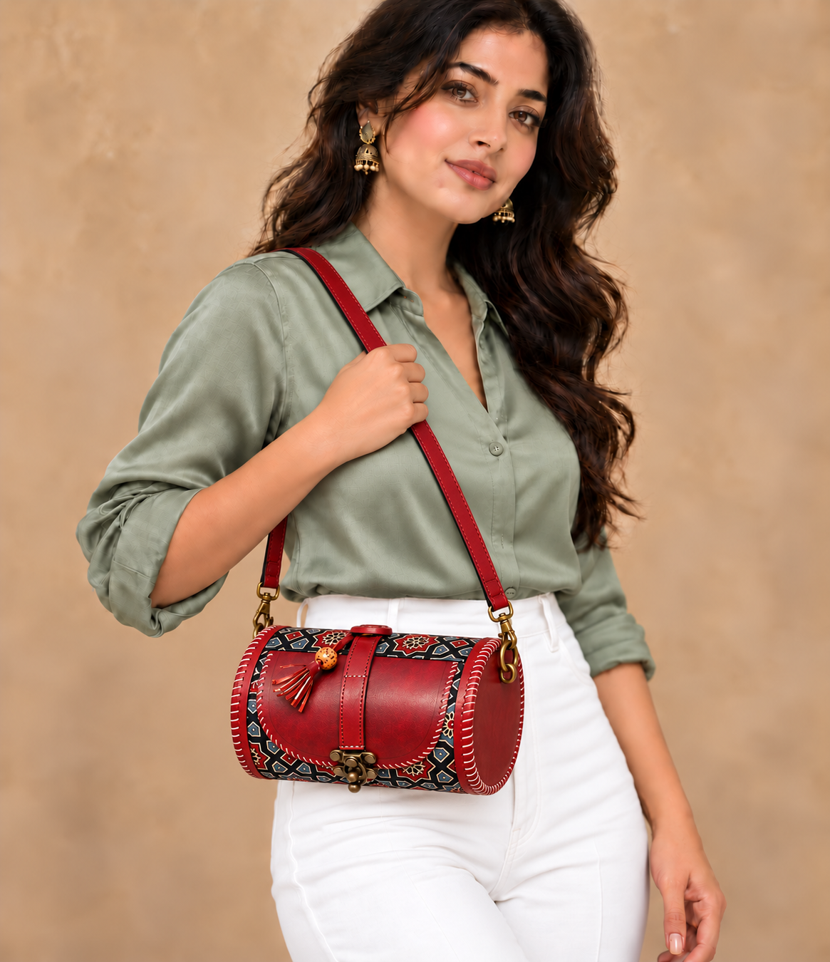 Brown & Indigo Traditional Dholak Handbag with side-attached leather sling, styled with sage blouse and white pants