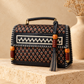 Hut Handbag in black – on a stone pedestal