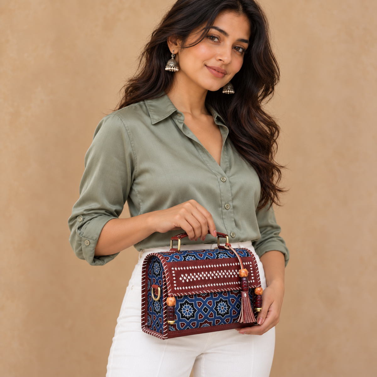 Hut Handbag in brown indigo – model wearing sage blouse and white pants