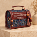 Hut Handbag in brown indigo – on a stone pedestal
