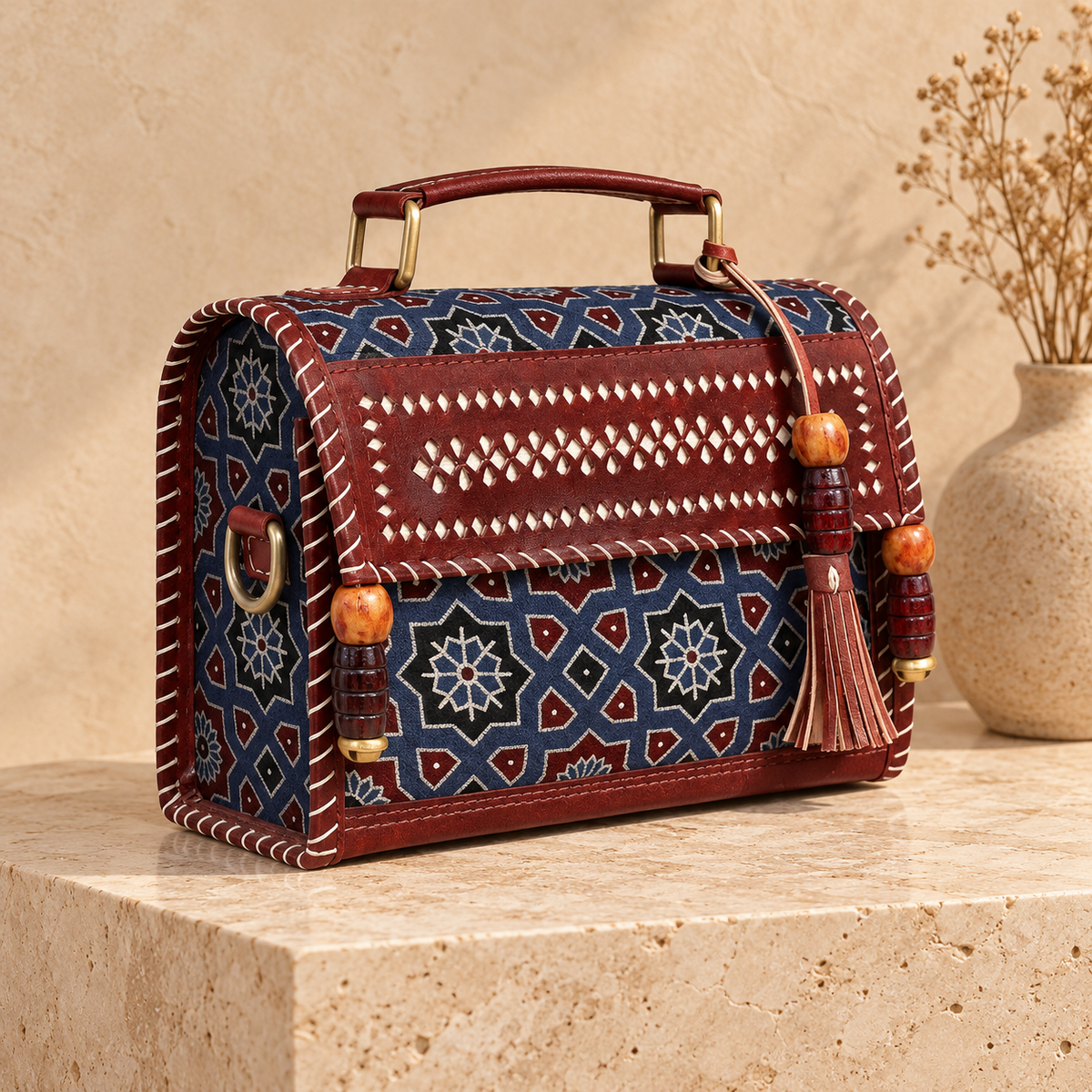 Hut Handbag in brown indigo – on a stone pedestal